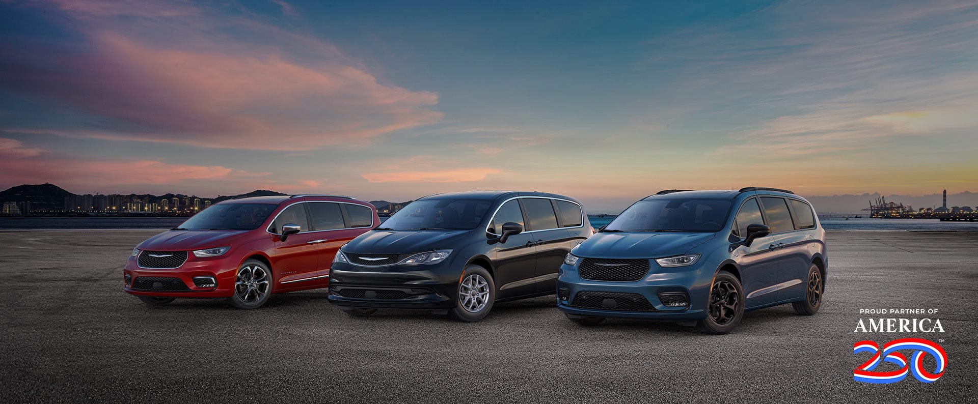 The 2025 Chrysler minivan lineup: from left to right, a red Chrysler Pacifica Pinnacle, a black Chrysler Voyager LX and a blue Chrysler Pacifica Hybrid Select with the Premium S Appearance Package. Proud Partner of America 250.